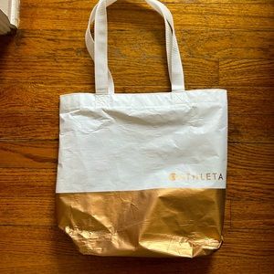 Gold and white athleta medium tote